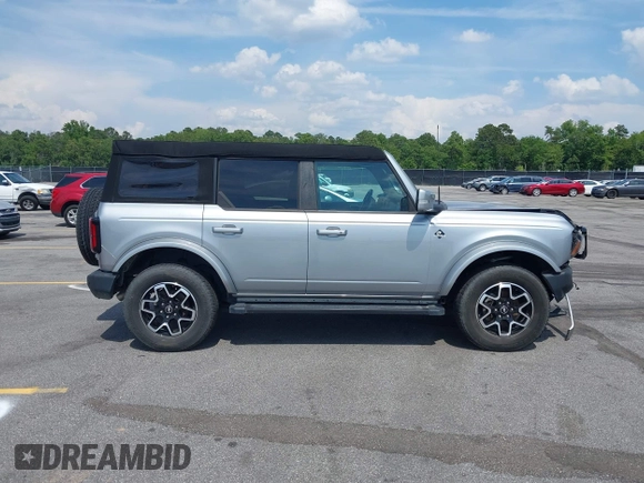 2023 Ford Bronco z VIN 1FMEE5DPXPLB06603, wystawiony jako IAAI lot #42183408 z przebiegiem 22 272 mil mil oraz . Historia ofert i sprzedaży dostępna na DreamBid. Obrazek 13.
