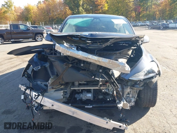 2020 Tesla Model Y Long Range with VIN 5YJYGDEE0LF041762, listed as a IAAI auction lot 40556913 with Not Provided miles and . Bid and sale history available at DreamBid. Image 13.