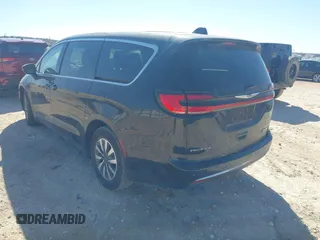 2023 Chrysler Pacifica Hybrid Touring L with VIN 2C4RC1L75PR611901, listed as a IAAI auction lot 41510935 with 44,156 mi miles and . Bid and sale history available at DreamBid. Image 3.