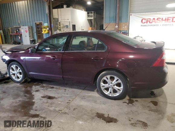 2012 Ford Fusion SE with VIN 3FAHP0HA0CR377773, listed as a Copart auction lot 57278885 with 133,700 mi miles and Salvage title. Bid and sale history available at DreamBid. Image 2.