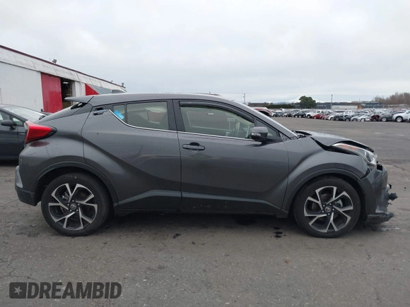 2019 Toyota C-HR XLE with VIN JTNKHMBX5K1035676, listed as a IAAI auction lot 41161562 with 185,962 mi miles. Bid and sale history available at carsss.com. Image 13.