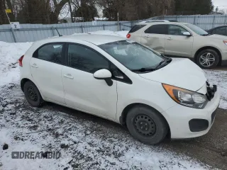 2014 Kia Rio LX with VIN KNADM5A35E6921756, listed as a Copart auction lot 84653184 with 181,703 mi miles and Salvage Title. Bid and sale history available at carsss.com. Image 4.