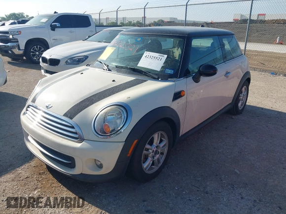 2013 MINI Hardtop with VIN WMWSU3C56DT681952, listed as a IAAI auction lot 42325521 with 124,405 mi miles and . Bid and sale history available at DreamBid. Image 2.