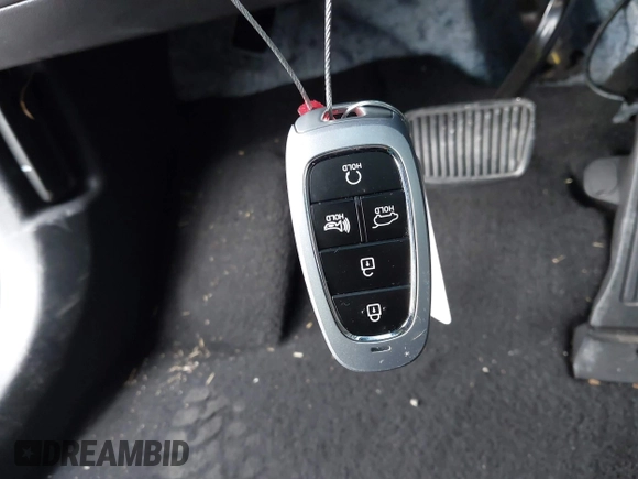 2022 Hyundai Tucson SEL with VIN 5NMJC3AE1NH012981, listed as a IAAI auction lot 41957812 with 38,284 mi miles and . Bid and sale history available at DreamBid. Image 11.