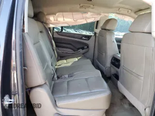 2017 Chevrolet Suburban LT z VIN 1GNSCHKC5HR329037, wystawiony jako Copart lot #52016315 z przebiegiem 215 859 mil mil oraz Szkoda całkowita • Salvage title. Historia ofert i sprzedaży dostępna na DreamBid. Obrazek 11.