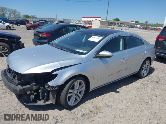 2014 Volkswagen CC Lux with VIN WVWRP7AN9EE504627, listed as a IAAI auction lot 42044187 with 114,153 mi miles and . Bid and sale history available at DreamBid. Image 2.