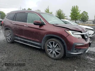 2019 Honda Pilot Touring 8-Passenger with VIN 5FNYF6H94KB056213, listed as a Copart auction lot 56429585 with 106,735 mi miles and Salvage title. Bid and sale history available at DreamBid. Image 4.