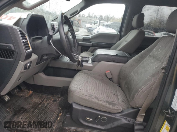 2015 Ford F-150 XLT with VIN 1FTEW1EF9FKD13777, listed as a Copart auction lot 47982534 with 165,364 mi miles and Salvage title. Bid and sale history available at DreamBid. Image 7.