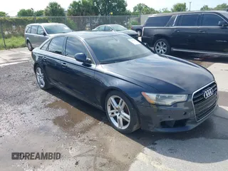 2014 Audi A6 Premium Plus with VIN WAUDFAFC7EN052529, listed as a IAAI auction lot 42667659 with 143,668 mi miles and . Bid and sale history available at DreamBid. Image 1.