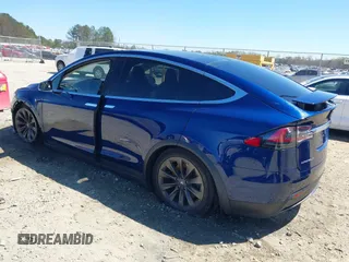 2017 Tesla Model X 90D z VIN 5YJXCBE26HF079022, wystawiony jako IAAI lot #41847954 z przebiegiem 74 940 mil mil oraz . Historia ofert i sprzedaży dostępna na DreamBid. Obrazek 3.