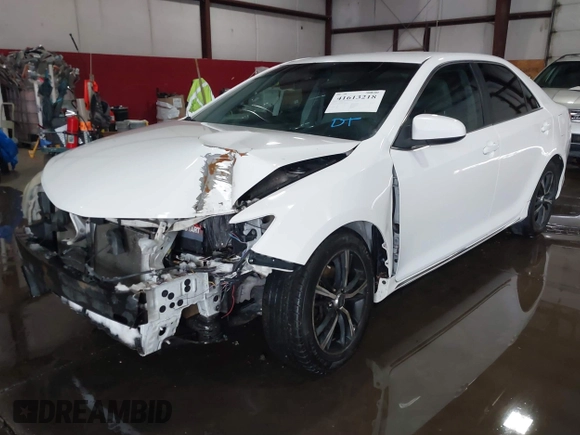 2014 Toyota Camry L with VIN 4T1BF1FKXEU306754, listed as a IAAI auction lot 41613218 with 195,692 mi miles. Bid and sale history available at carsss.com. Image 2.