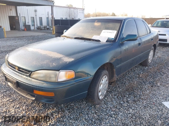 1996 Toyota Camry DX with VIN JT2BG12K2T0416797, listed as a IAAI auction lot 41789017 with 312,858 mi miles. Bid and sale history available at carsss.com. Image 2.