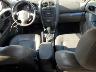 2002 Hyundai Santa Fe GLS with VIN KM8SC13D42U162953, listed as a Copart auction lot 77953044 with 98,463 mi miles and Clean Title. Bid and sale history available at carsss.com. Image 8.