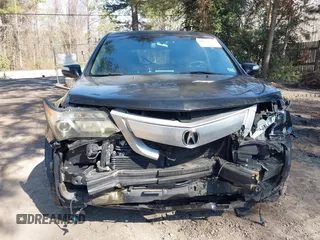 2012 Acura MDX Tech/Entertainment Pkg with VIN 2HNYD2H42CH527025, listed as a IAAI auction lot 41642926 with 140,876 mi miles. Bid and sale history available at carsss.com. Image 6.