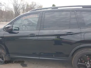 2019 Honda Passport EX-L with VIN 5FNYF8H5XKB024116, listed as a IAAI auction lot 42055543 with 68,641 mi miles and . Bid and sale history available at DreamBid. Image 14.
