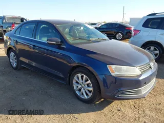 2014 Volkswagen Jetta SE with VIN 3VWD17AJ5EM355147, listed as a IAAI auction lot 41851993 with 144,838 mi miles and . Bid and sale history available at DreamBid. Image 1.