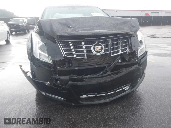 2013 Cadillac XTS Premium z VIN 2G61S5S39D9112491, wystawiony jako IAAI lot #42216373 z przebiegiem 145 338 mil mil oraz . Historia ofert i sprzedaży dostępna na DreamBid. Obrazek 6.