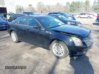 2011 Cadillac CTS Luxury z VIN 1G6DG5EY2B0122759, wystawiony jako IAAI lot #41790846 z przebiegiem 107 243 mil mil oraz . Historia ofert i sprzedaży dostępna na DreamBid. Obrazek 1.