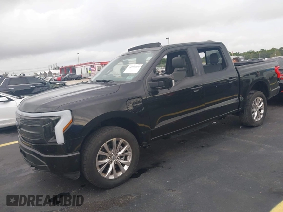 2023 Ford F-150 Lightning Pro with VIN 1FT6W1EV3PWG08587, listed as a IAAI auction lot 42418036 with Not provided miles and . Bid and sale history available at DreamBid. Image 2.