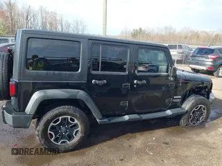 2013 Jeep Wrangler Unlimited Freedom z VIN 1C4BJWDG8DL648870, wystawiony jako IAAI lot #41909372 z przebiegiem 184 203 mil mil oraz . Historia ofert i sprzedaży dostępna na DreamBid. Obrazek 13.