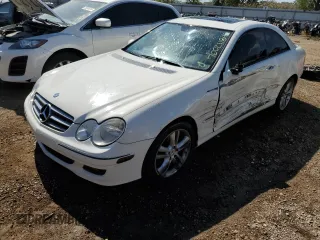 2009 Mercedes-Benz CLK-Class 3.5L with VIN WDBTJ56H09F261819, listed as a Copart auction lot 70021184 with 130,976 mi miles and Salvage Title. Bid and sale history available at carsss.com. Image 1.