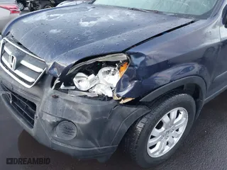 2006 Honda CR-V EX with VIN JHLRD788X6C011242, listed as a IAAI auction lot 41714756 with 199,074 mi miles. Bid and sale history available at carsss.com. Image 6.