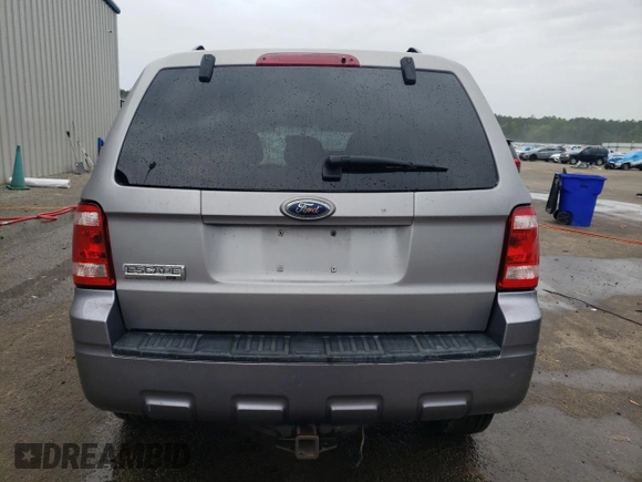 2008 Ford Escape XLT с VIN 1FMCU031X8KB42549, выставлен на аукционе Copart как лот 55813115 с пробегом 156 632 миль миль и Списание • Salvage title. История ставок и продаж доступна на DreamBid. Изображение 6.