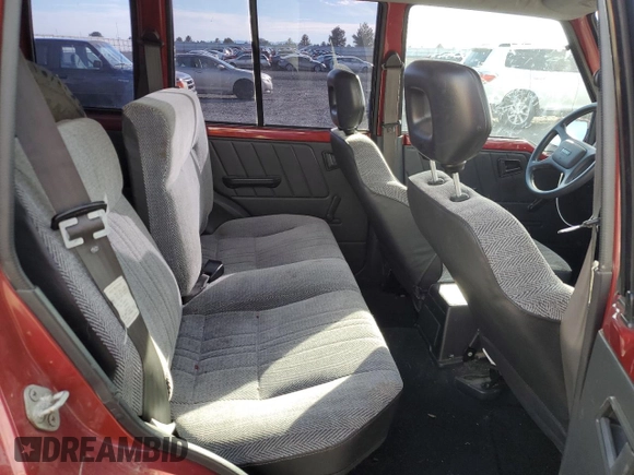 1995 Suzuki Sidekick z VIN JS3TD03V6S4113425, wystawiony jako Copart lot #76973244 z przebiegiem 152 638 mil mil oraz Szkody całkowita. Historia ofert i sprzedaży dostępna na DreamBid. Obrazek 10.