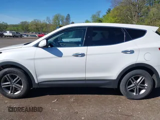 2018 Hyundai Santa Fe 2.4L z VIN 5NMZTDLB3JH090748, wystawiony jako IAAI lot #42145245 z przebiegiem 112 314 mil mil oraz . Historia ofert i sprzedaży dostępna na DreamBid. Obrazek 15.