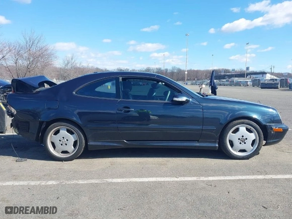 2002 Mercedes-Benz CLK-Class AMG with VIN WDBLJ74GX2T106286, listed as a IAAI auction lot 41737170 with 136,170 mi miles. Bid and sale history available at carsss.com. Image 13.