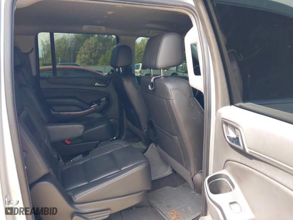 2020 Chevrolet Suburban Premier with VIN 1GNSCJKCXLR219679, listed as a IAAI auction lot 41806579 with 90,132 mi miles. Bid and sale history available at carsss.com. Image 8.