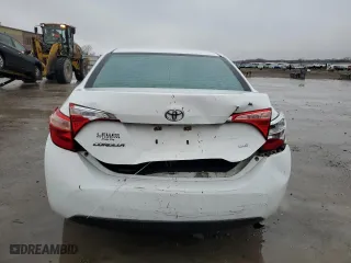 2019 Toyota Corolla L with VIN 5YFBURHE6KP884410, listed as a Copart auction lot 86710474 with 105,265 mi miles and Salvage Title. Bid and sale history available at carsss.com. Image 6.