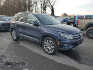 2016 Volkswagen Tiguan R-Line with VIN WVGBV7AX5GW573820, listed as a Copart auction lot 42363515 with 124,283 mi miles and Salvage Title. Bid and sale history available at DreamBid. Image 4.