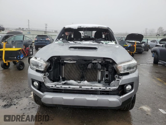 2021 Toyota Tacoma 4WD SR5 with VIN 3TMDZ5BN7MM105408, listed as a Copart auction lot 45128645 with 0 mi miles and Salvage Title. Bid and sale history available at carsss.com. Image 5.