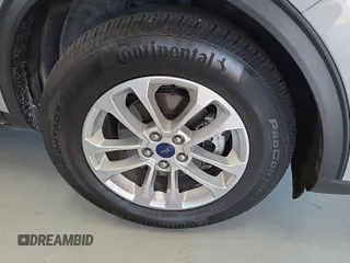 2022 Ford Escape SE with VIN 1FMCU9G65NUB41402, listed as a IAAI auction lot 42733931 with 62,151 mi miles and . Bid and sale history available at DreamBid. Image 15.