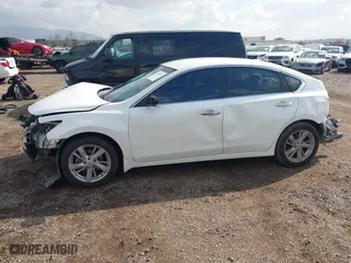 2013 Nissan Altima 2.5 SL with VIN 1N4AL3AP7DN474731, listed as a IAAI auction lot 41439282 with 180,718 mi miles. Bid and sale history available at carsss.com. Image 15.
