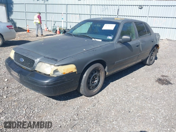 2011 Ford Crown Victoria with VIN 2FABP7AV9BX121739, listed as a IAAI auction lot 41763311 with 215,727 mi miles. Bid and sale history available at carsss.com. Image 17.
