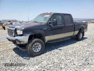 2000 Ford F-350 XL with VIN 1FTSW31F3YED03297, listed as a Copart auction lot 63821805 with 246,769 mi miles and Salvage title. Bid and sale history available at DreamBid. Image 1.