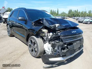 2023 Kia Niro SX Touring with VIN KNDCT3LE6P5038102, listed as a IAAI auction lot 41710555 with 57,669 mi miles. Bid and sale history available at carsss.com. Image 1.