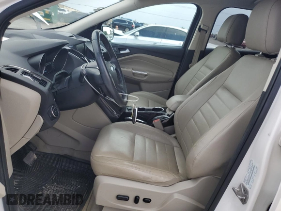 2014 Ford Escape Titanium с VIN 1FMCU0J97EUB15513, выставлен на аукционе Copart как лот 57391715 с пробегом 125 851 миль миль и Списание • Salvage title. История ставок и продаж доступна на DreamBid. Изображение 7.
