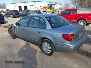2002 Saturn SL z VIN 1G8ZH52892Z151119, wystawiony jako IAAI lot #41764757 z przebiegiem 82 017 mil mil oraz . Historia ofert i sprzedaży dostępna na DreamBid. Obrazek 3.