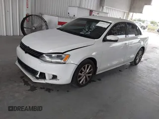 2014 Volkswagen Jetta SE z VIN 3VWD17AJ3EM265396, wystawiony jako IAAI lot #42434771 z przebiegiem 114 931 mil mil oraz . Historia ofert i sprzedaży dostępna na DreamBid. Obrazek 17.