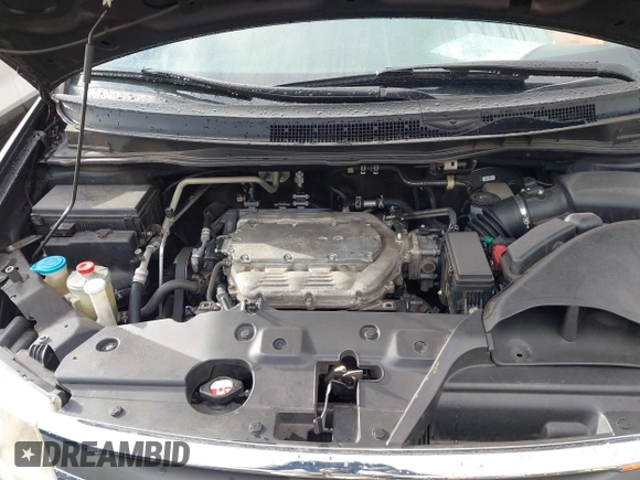 2012 Honda Odyssey EX-L with VIN 5FNRL5H64CB142247, listed as a IAAI auction lot 41722015 with 179,637 mi miles and . Bid and sale history available at carsss.com. Image 10.