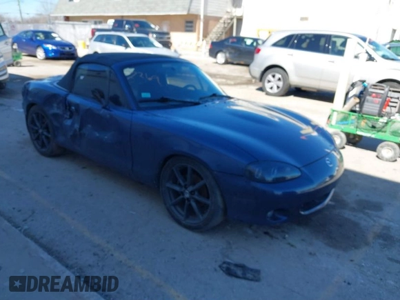 2002 Mazda MX-5 Miata Cloth z VIN JM1NB353920234533, wystawiony jako IAAI lot #41735487 z przebiegiem 112 661 mil mil oraz . Historia ofert i sprzedaży dostępna na DreamBid. Obrazek 1.