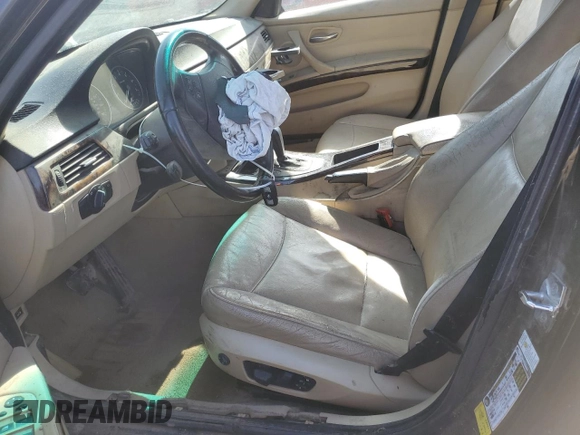 2007 BMW 3 Series 328i with VIN WBAVA37557NL12699, listed as a Copart auction lot 46258735 with 173,338 mi miles and Salvage title. Bid and sale history available at DreamBid. Image 7.