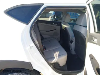 2020 Hyundai Tucson Sport with VIN KM8J33AL8LU251329, listed as a IAAI auction lot 41254246 with 61,626 mi miles. Bid and sale history available at carsss.com. Image 8.
