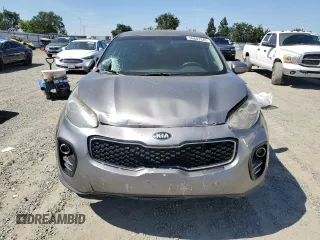 2017 Kia Sportage LX z VIN KNDPMCAC9H7159793, wystawiony jako Copart lot #56603345 z przebiegiem 157 860 mil mil oraz Szkoda całkowita • Salvage title. Historia ofert i sprzedaży dostępna na DreamBid. Obrazek 5.
