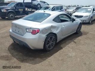 2013 Scion FR-S with VIN JF1ZNAA14D2714039, listed as a IAAI auction lot 42041189 with 167,685 mi miles. Bid and sale history available at carsss.com. Image 4.