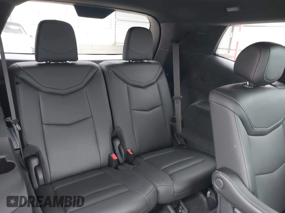 2021 Cadillac XT6 Premium Luxury z VIN 1GYKPCRS8MZ233209, wystawiony jako IAAI lot #40012714 z przebiegiem 45 599 mil mil oraz . Historia ofert i sprzedaży dostępna na DreamBid. Obrazek 8.