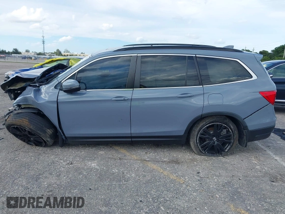 2022 Honda Pilot Special Edition with VIN 5FNYF5H20NB023811, listed as a IAAI auction lot 40612518 with Not Provided miles and . Bid and sale history available at carsss.com. Image 15.